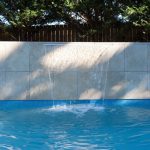 Lan Cove Concrete Pool with waterfall feature