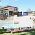 Swimming pool in front of property built by Blue Haven Pools in Padstow Heights Sydney