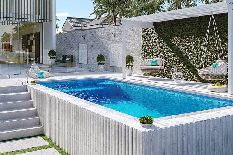 Modern semi-inground concrete pool with textured retaining walls in a contemporary Sydney backyard
