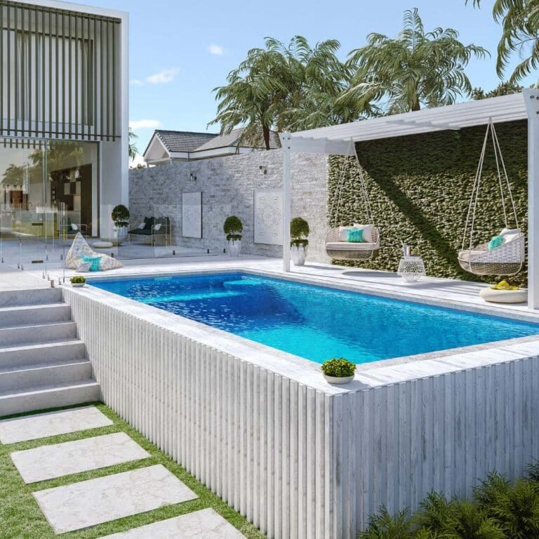 Modern above-ground concrete pool in a landscaped backyard