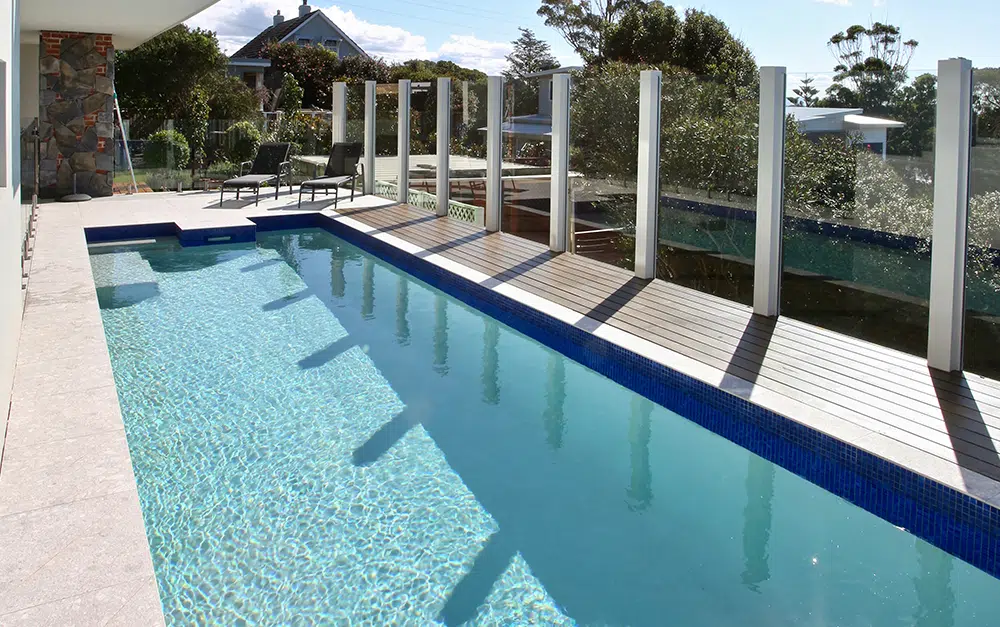 Elevated coastal pool in Kiama with glass pool fencing and ocean views by Blue Haven Pools