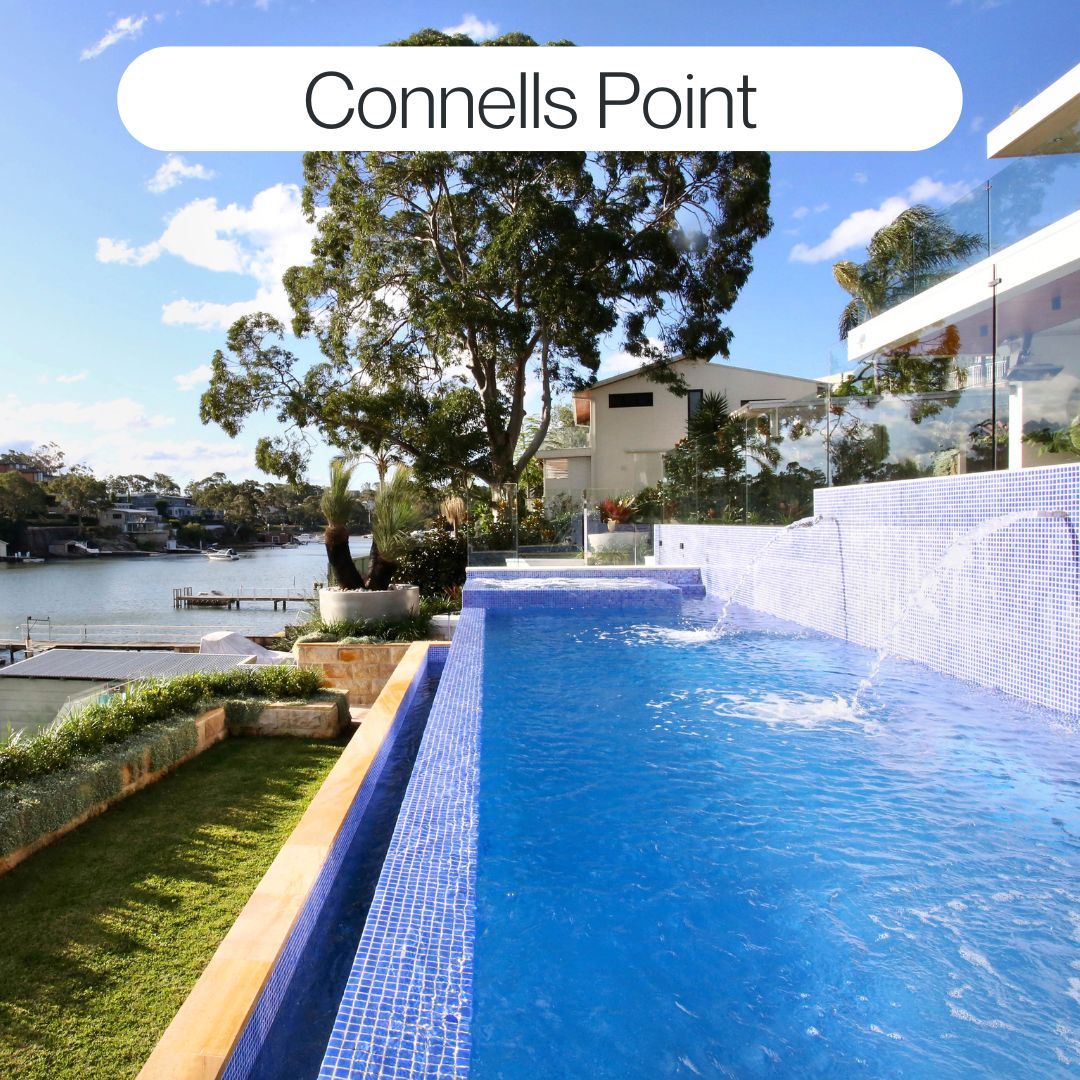Waterfront custom concrete pool in Connells Point with tiled spa, glass fencing and luxury outdoor pool design