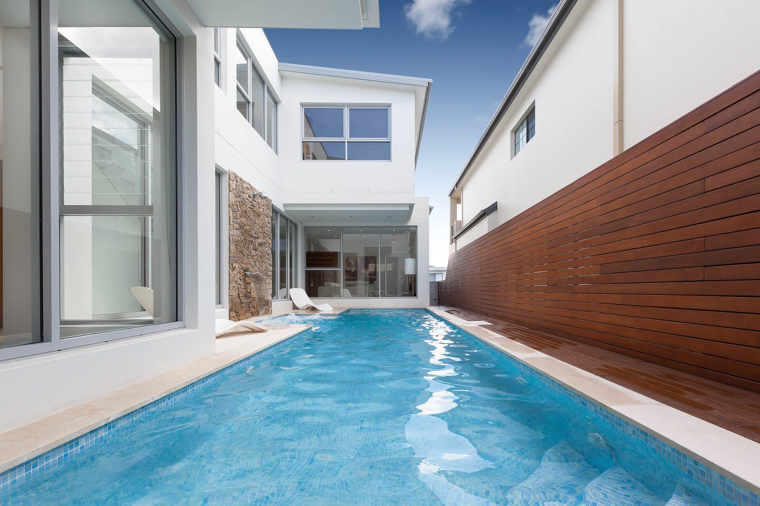 South Hurstville lap pool with reflective tiled interior and resort-style backyard atmosphere