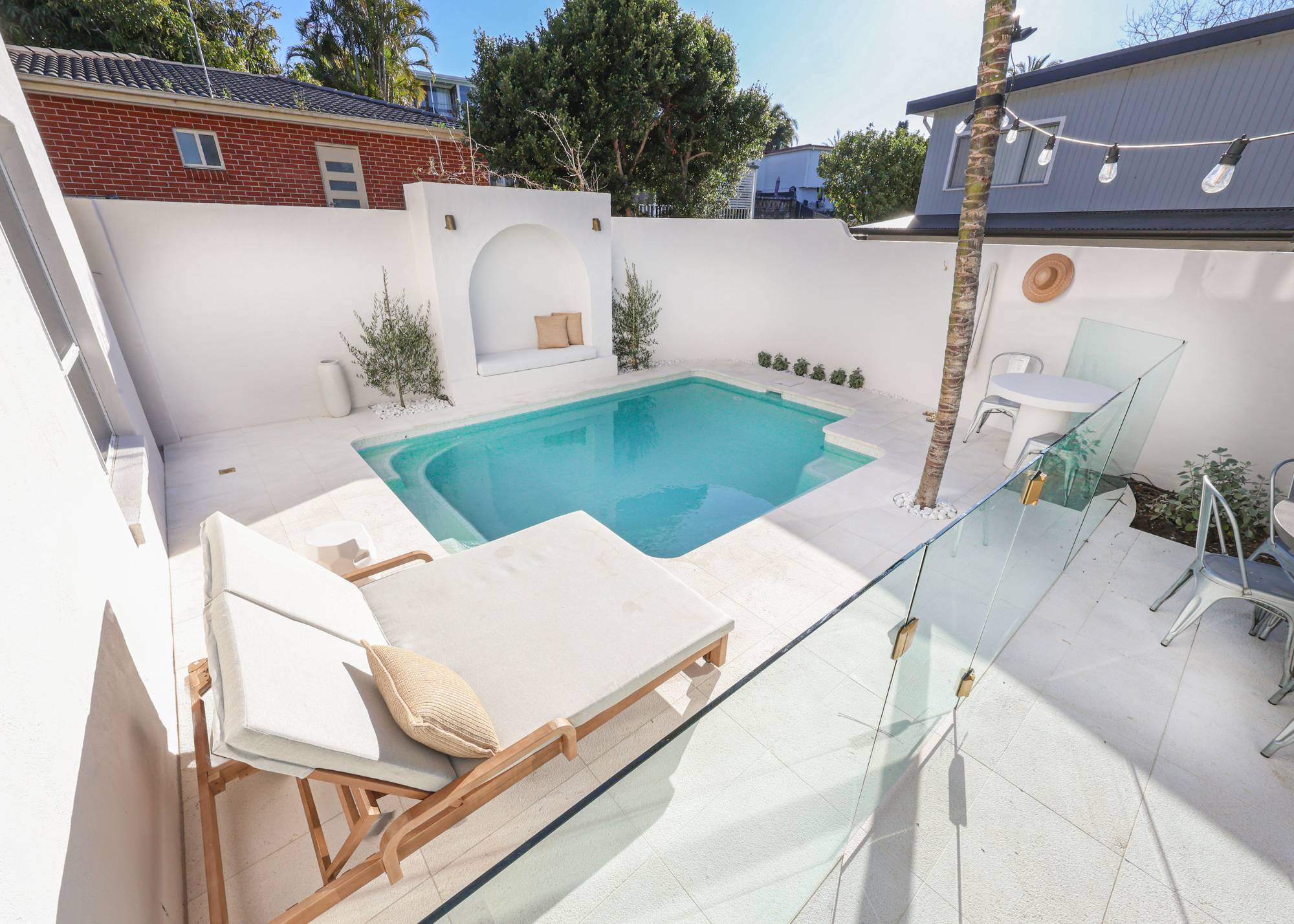 Custom Blue Haven swimming pool and landscaped outdoor area