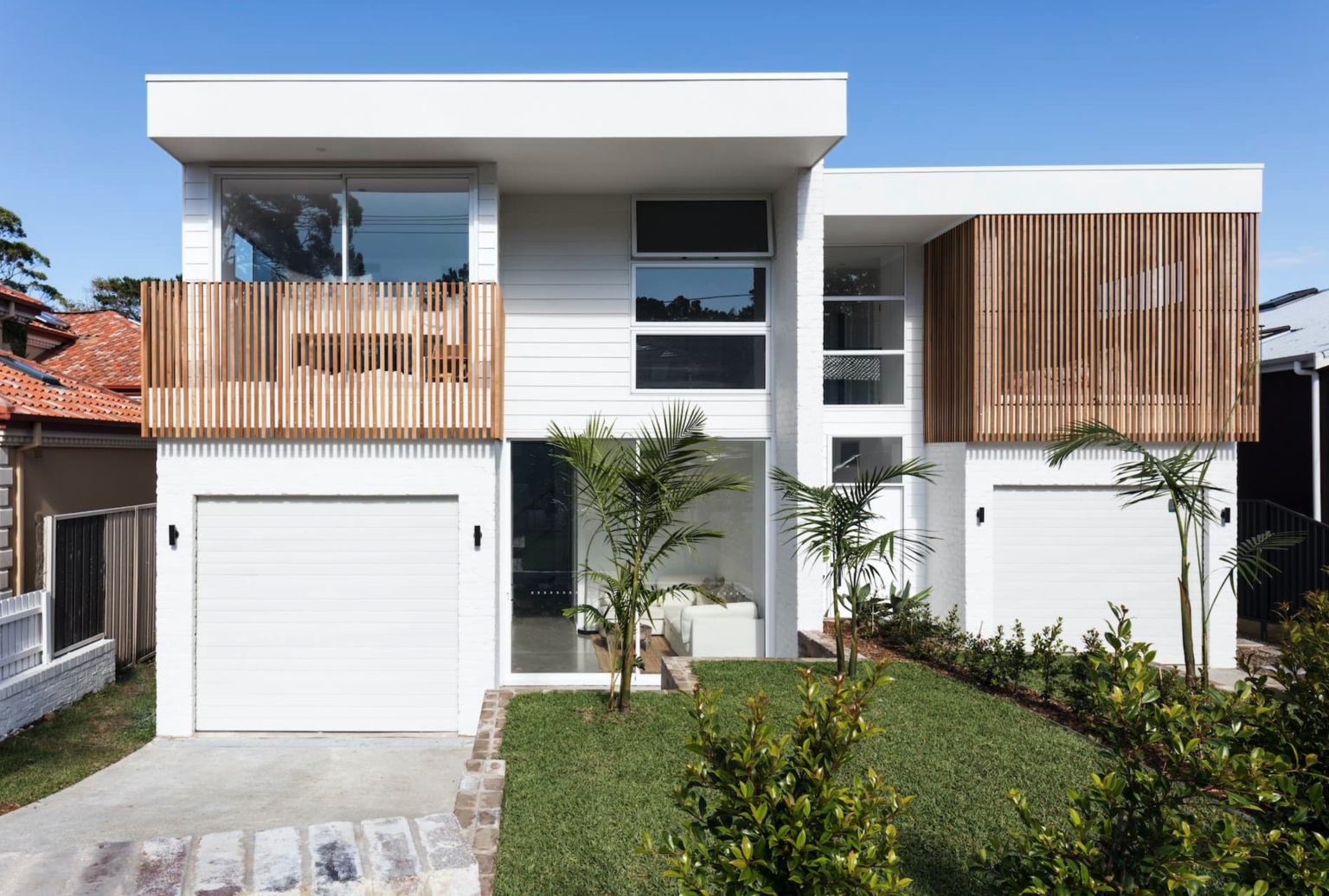 Solar heated backyard pool connected to alfresco living area in Caringbah South duplex home