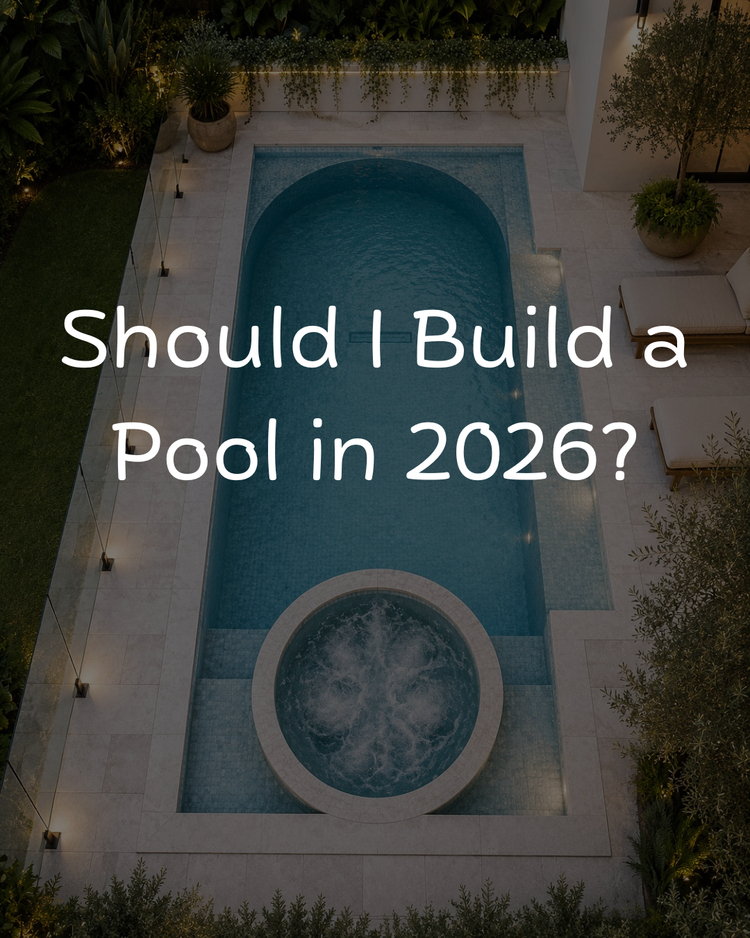 Modern backyard swimming pool beside an Australian home with glass fencing